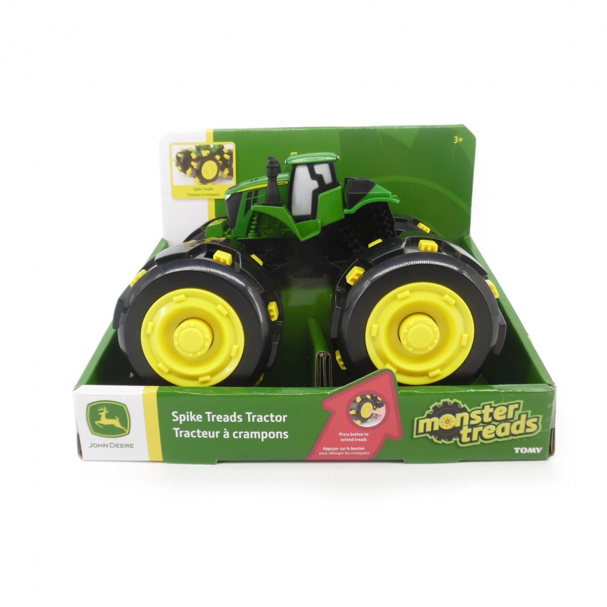 Traktor John Deere z oponami z kolcami